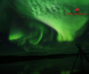 Aurora-Borealis-in-dark-skies-Yellowknife-VacationsJPG